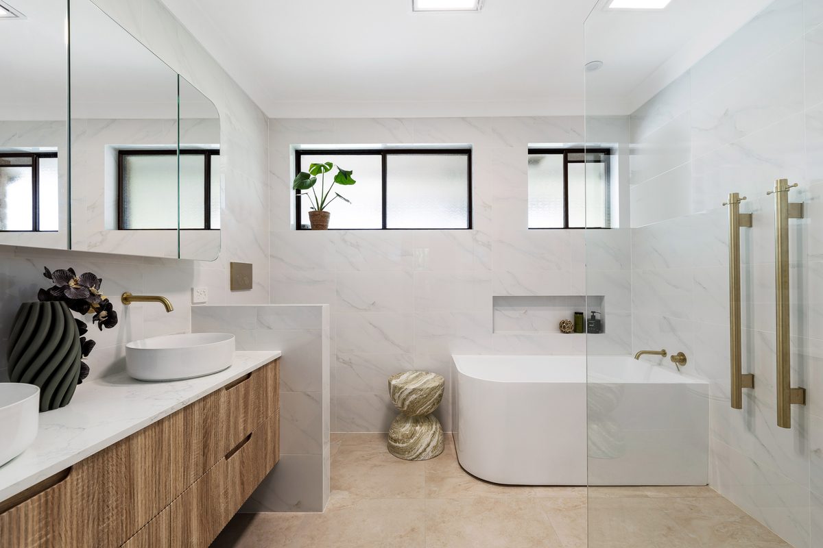 Bathroom renovation with double basin vanity and freestanding ba