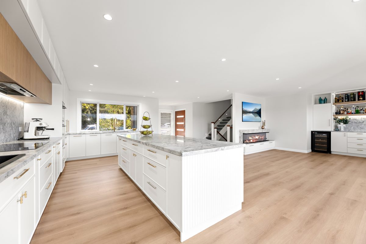 Open-plan kitchen and living extension with staircase
