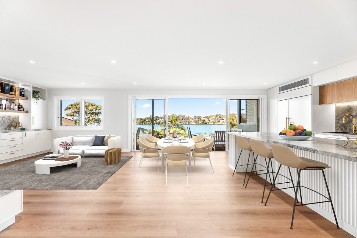 Open-plan living, dining and kitchen extension with water views