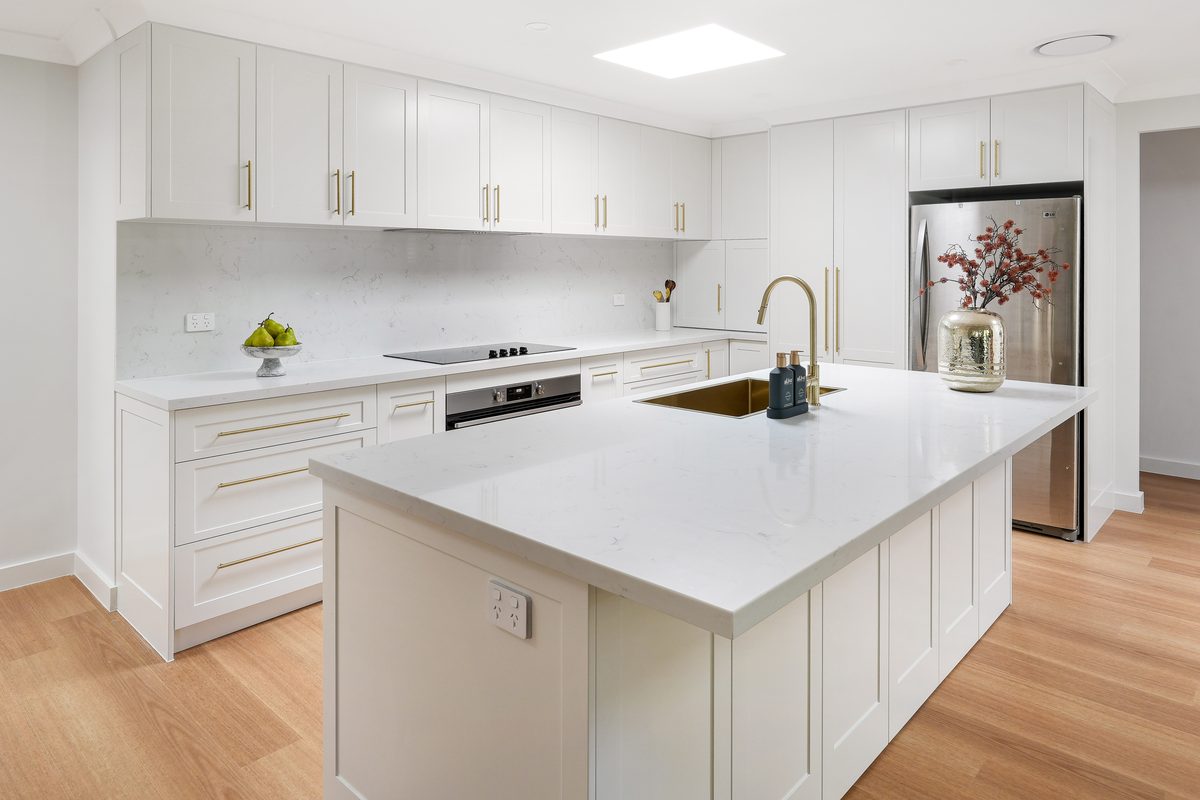 White shaker kitchen renovation with large island bench